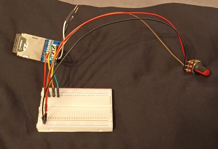 Intermediate board, contains the SD Card Reader and potentiometer (left), will contain other wires to connect from function buttons to GPIOs as well as a Digital-to-Analog converter